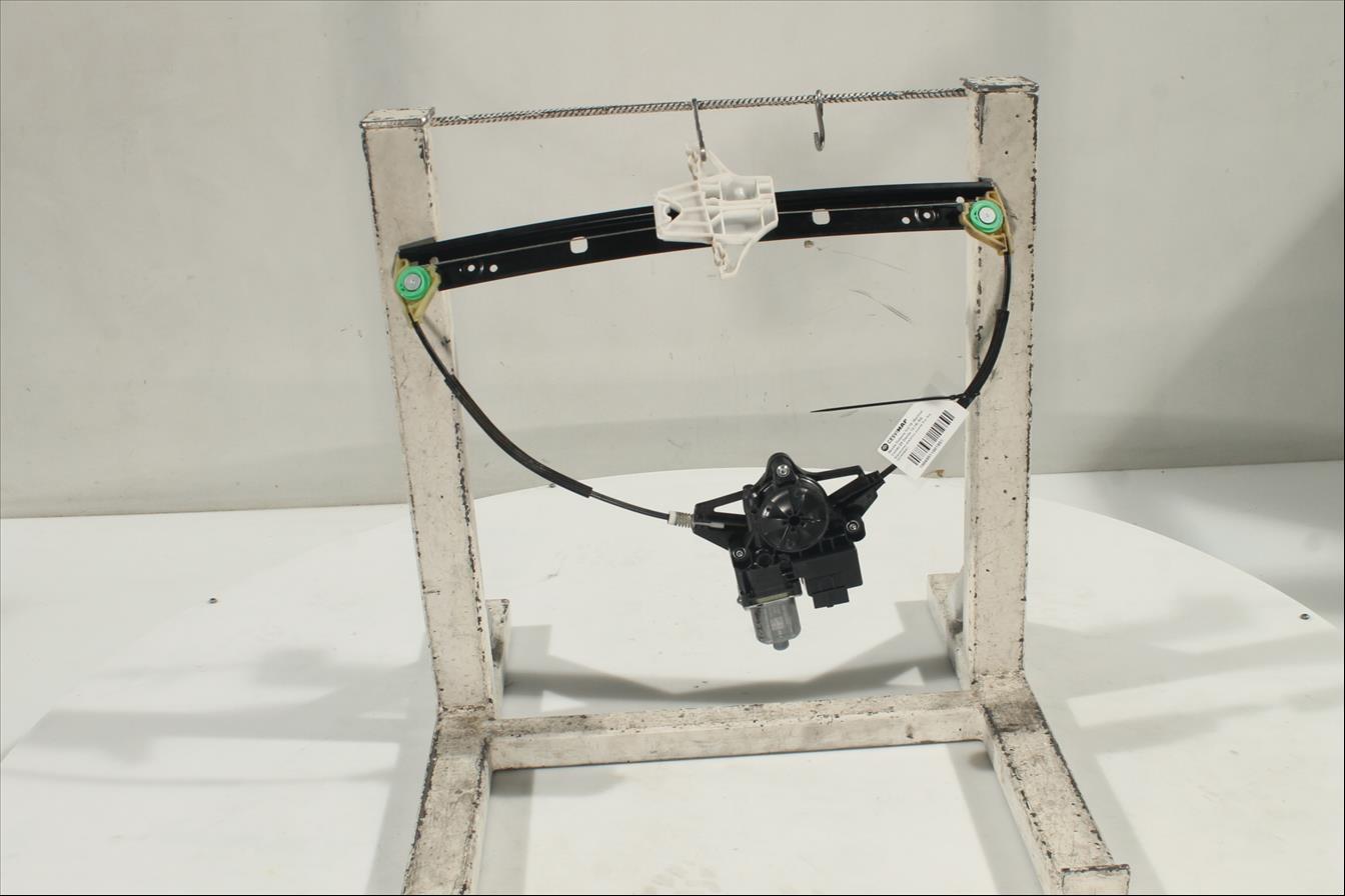 Elevalunas eléctrico puerta Tra. Izq.