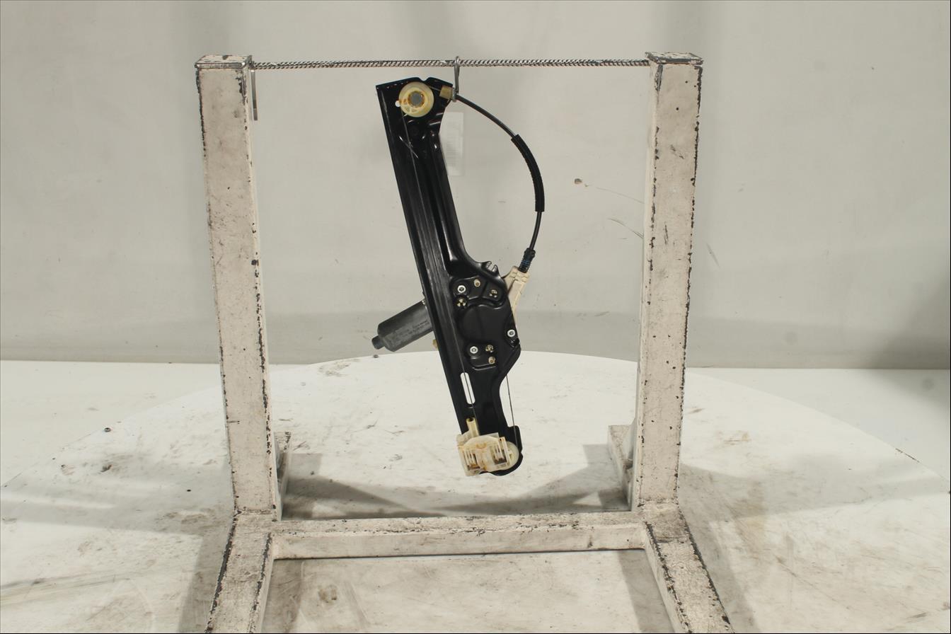 Elevalunas eléctrico puerta Tra. Izq.