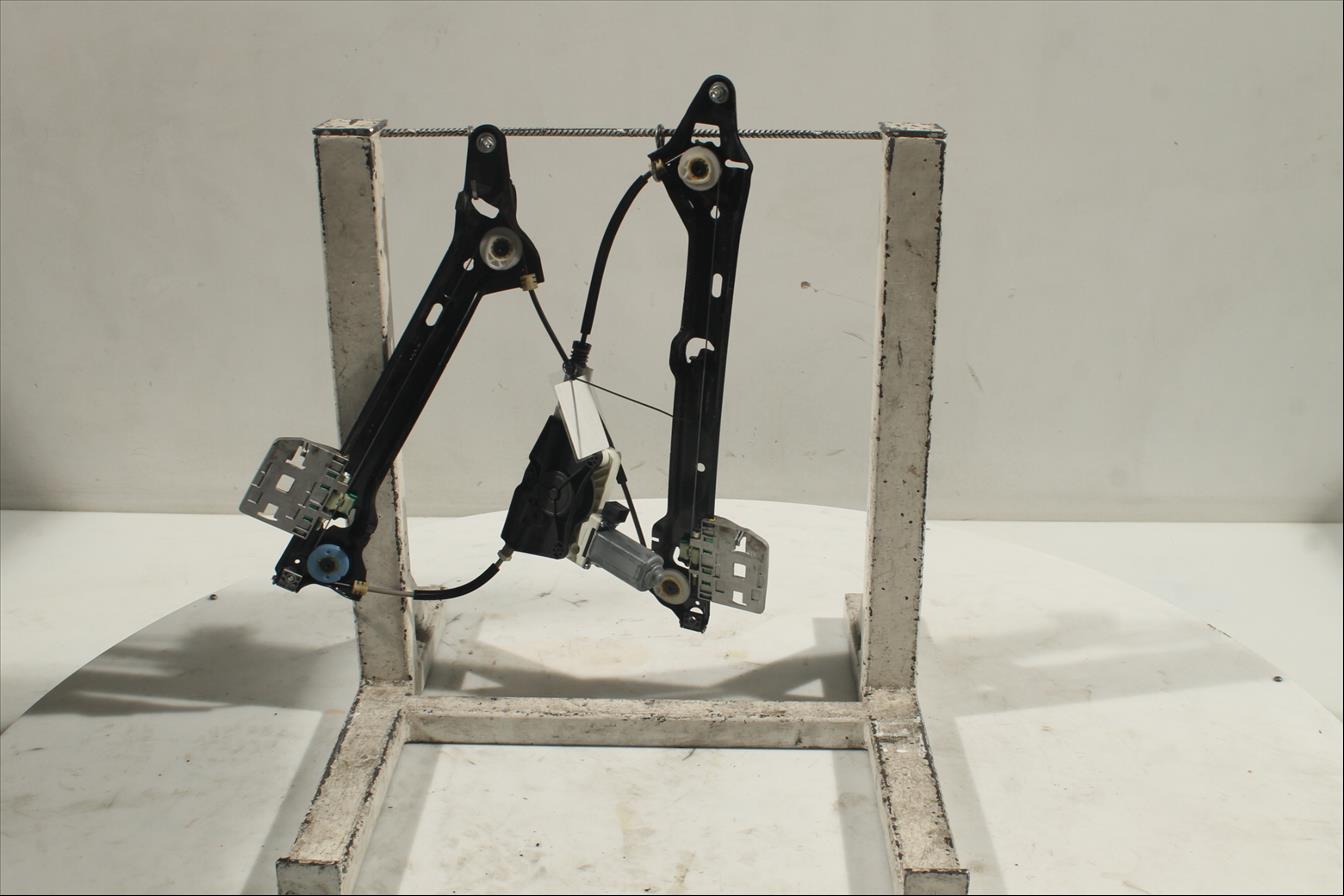 Elevalunas eléctrico puerta Tra. Izq.