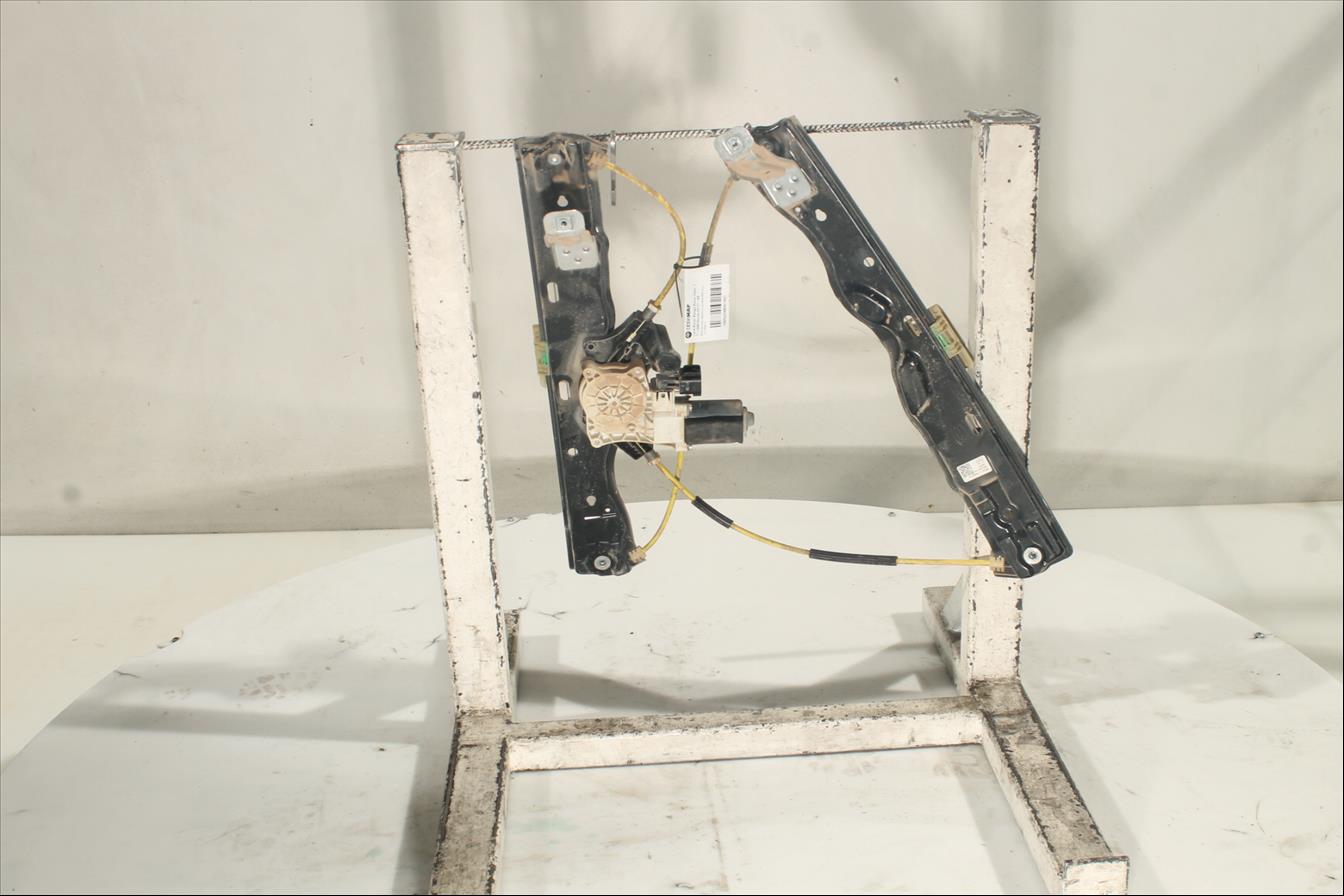 Elevalunas eléctrico puerta Tra. Izq.