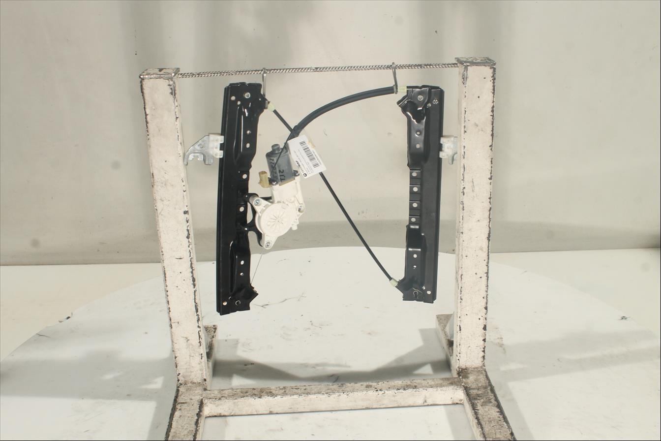 Elevalunas eléctrico puerta Tra. Izq.