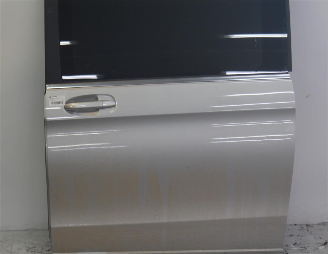 Puerta lateral Izq.