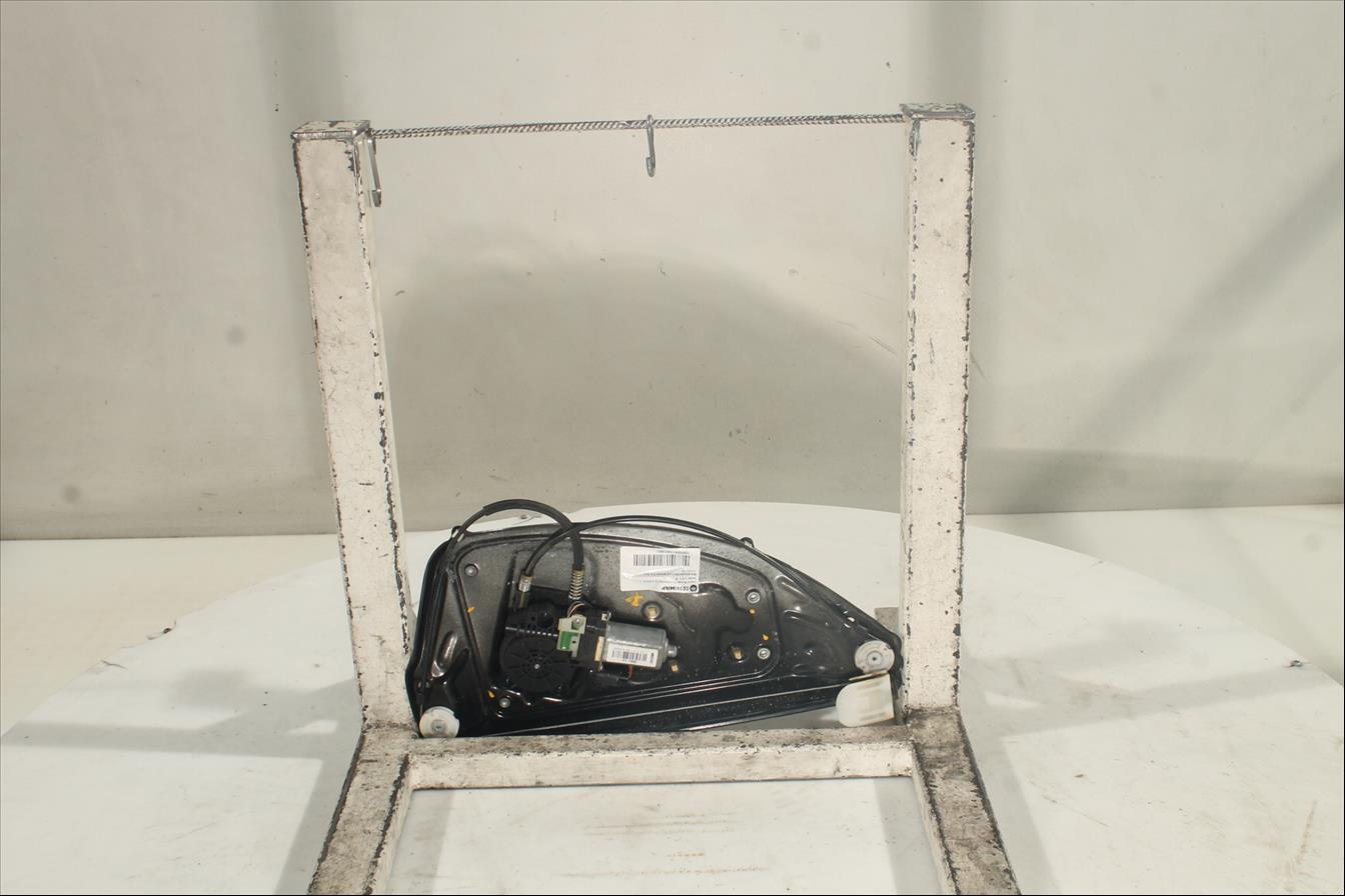 Elevalunas eléctrico puerta Tra. Izq.