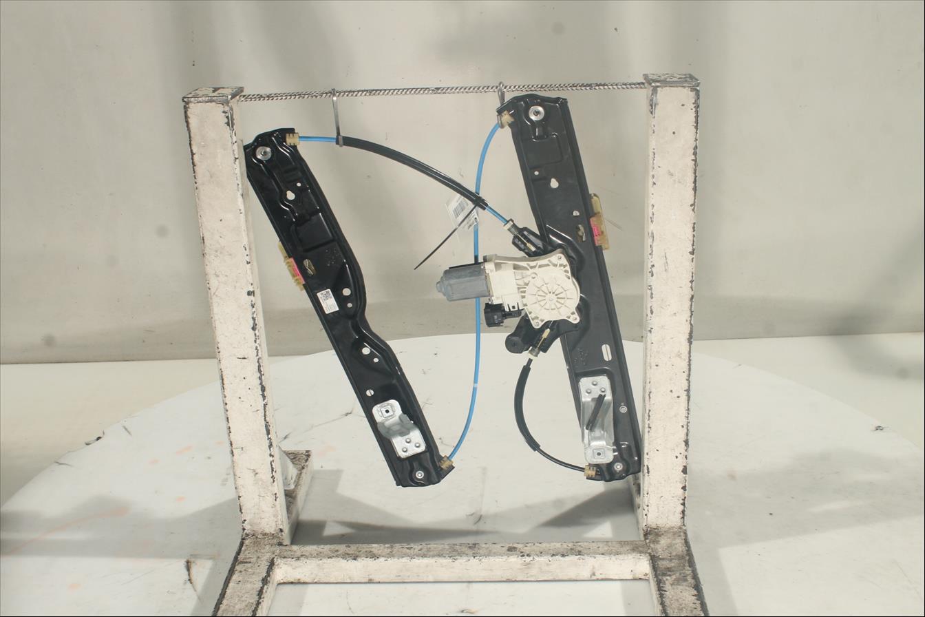 Elevalunas eléctrico puerta Tra. Izq.