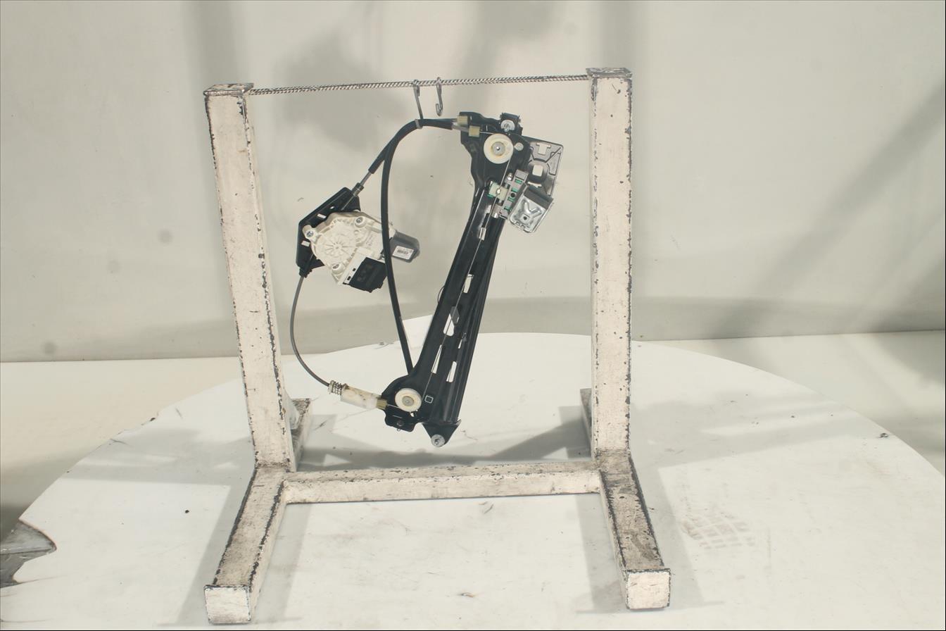 Elevalunas eléctrico puerta Tra. Izq.