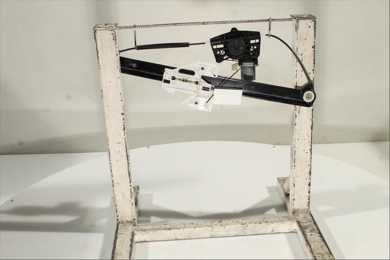 Elevalunas eléctrico puerta Tra. Izq.