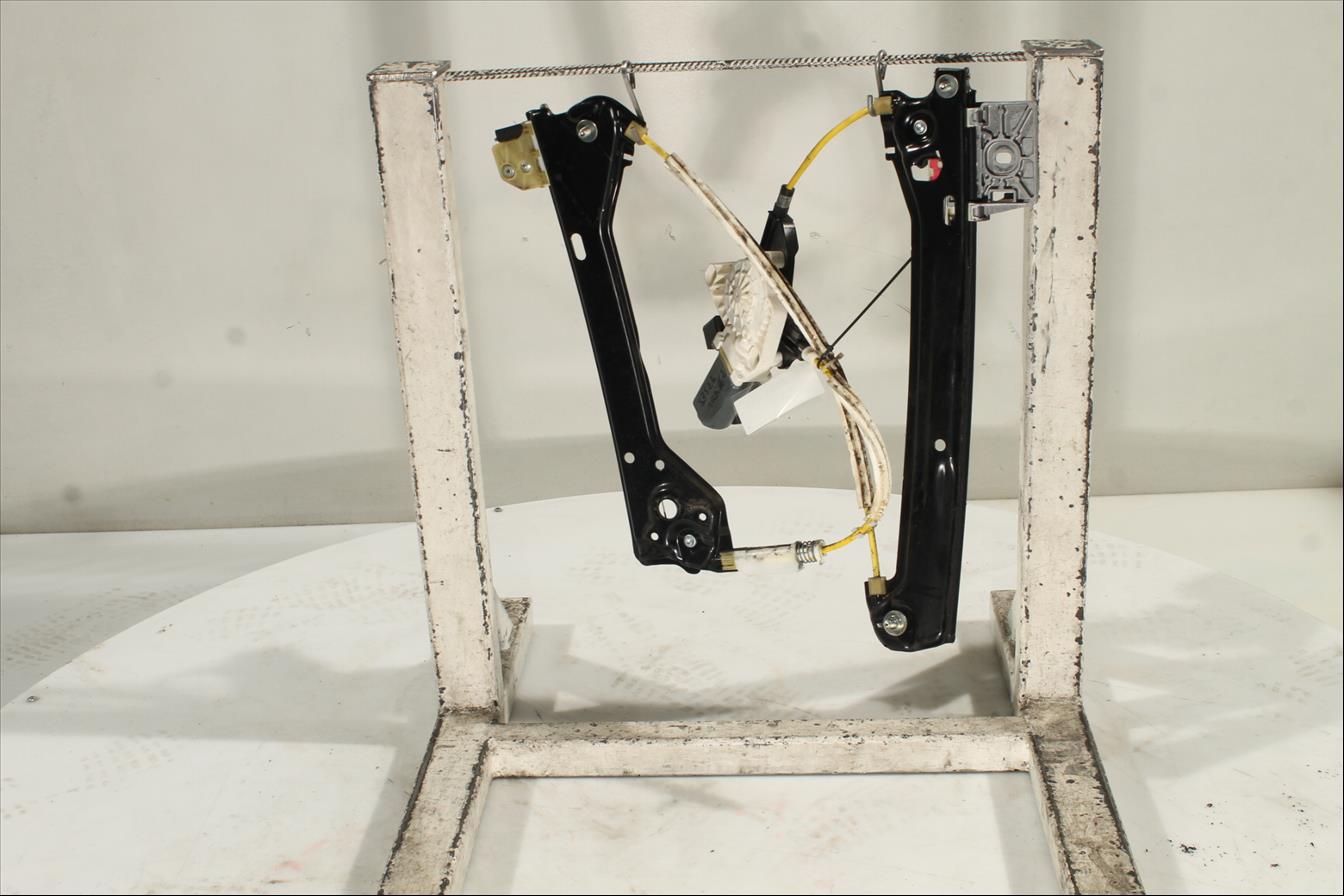 Elevalunas eléctrico puerta Tra. Izq.