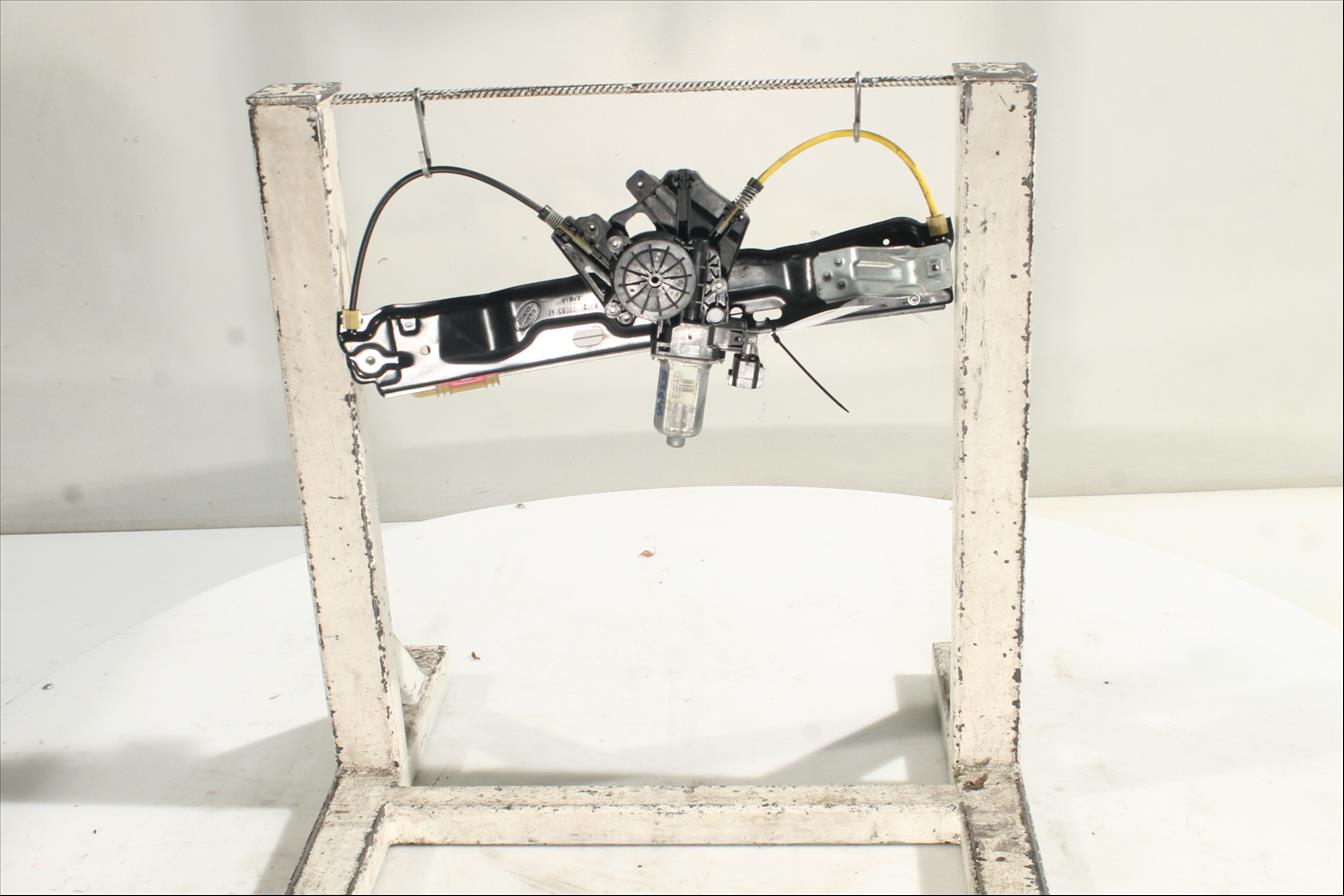 Elevalunas eléctrico puerta Tra. Izq.