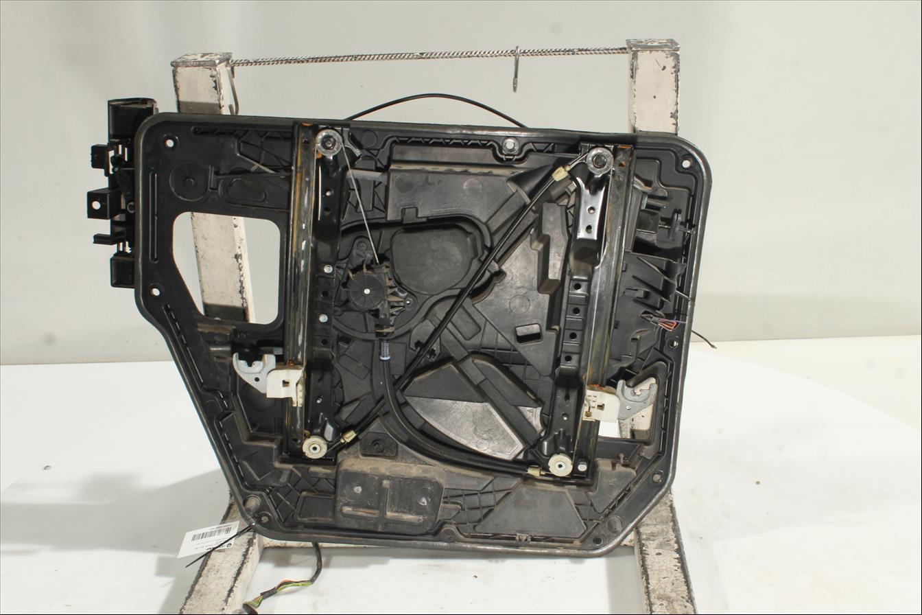 Elevalunas eléctrico puerta Tra. Izq.