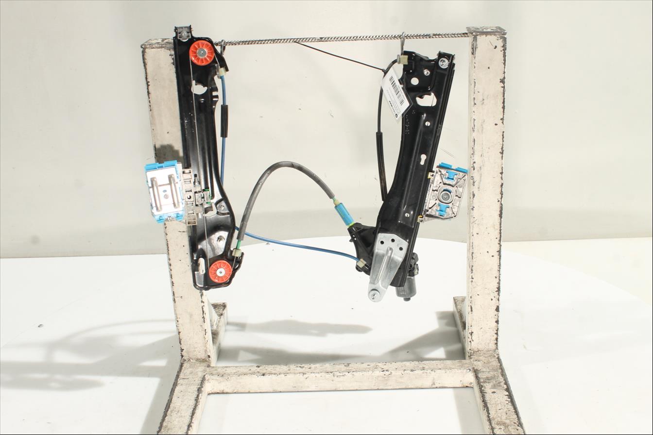 Elevalunas eléctrico puerta Tra. Izq.