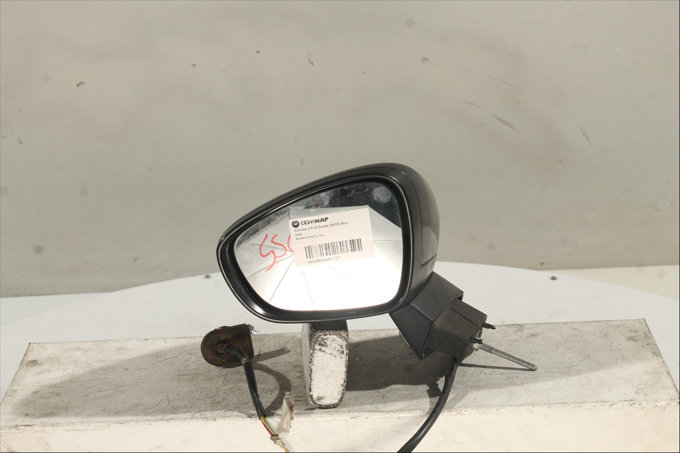 Espejo exterior Izq.