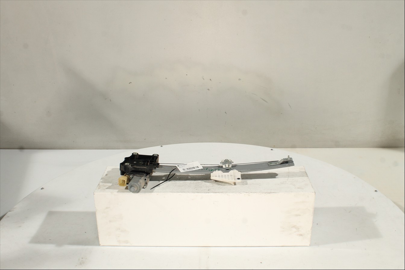 Elevalunas eléctrico puerta Tra. Izq.